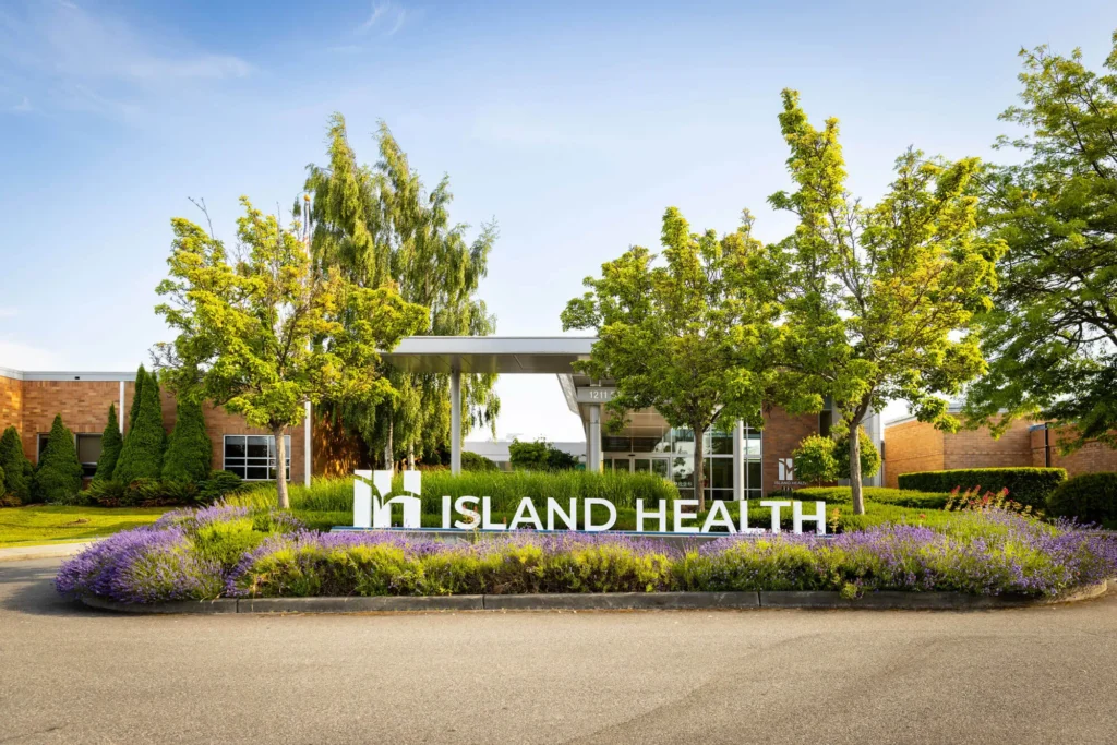 The outside of Island Health facility with signage