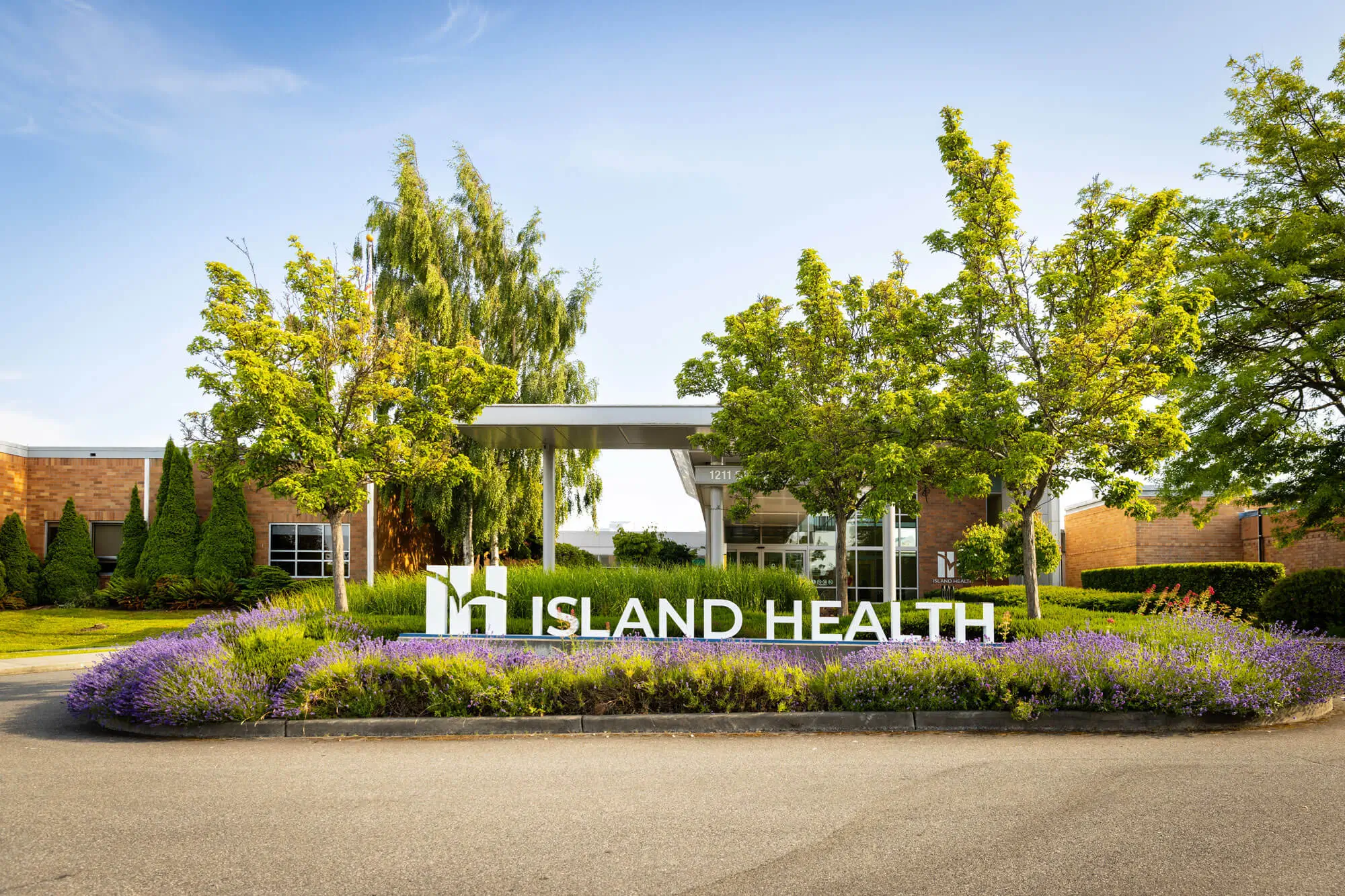 The outside of Island Health facility with signage